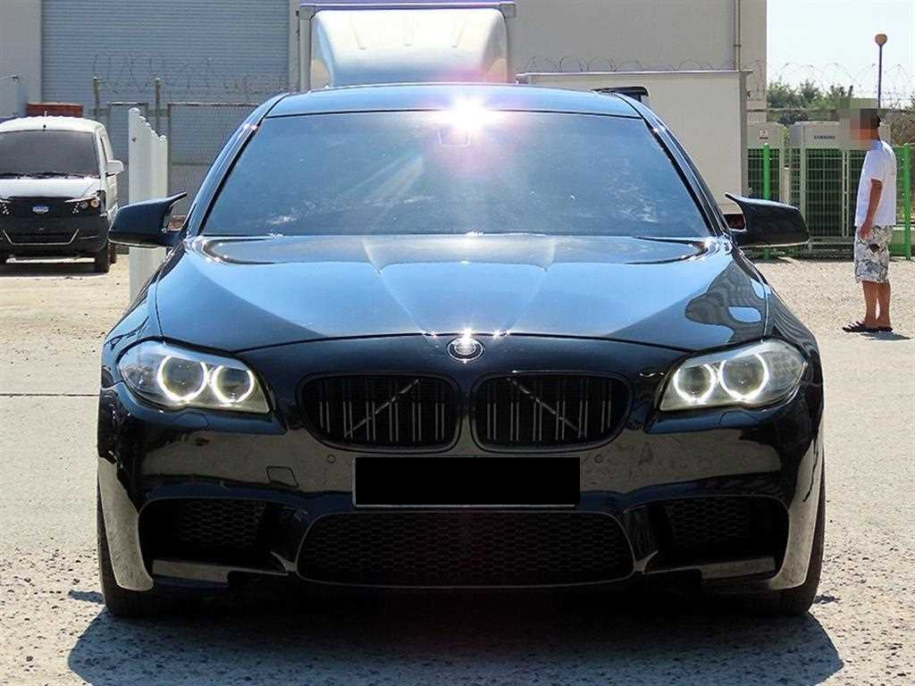 BMW 5-Series — photo 01