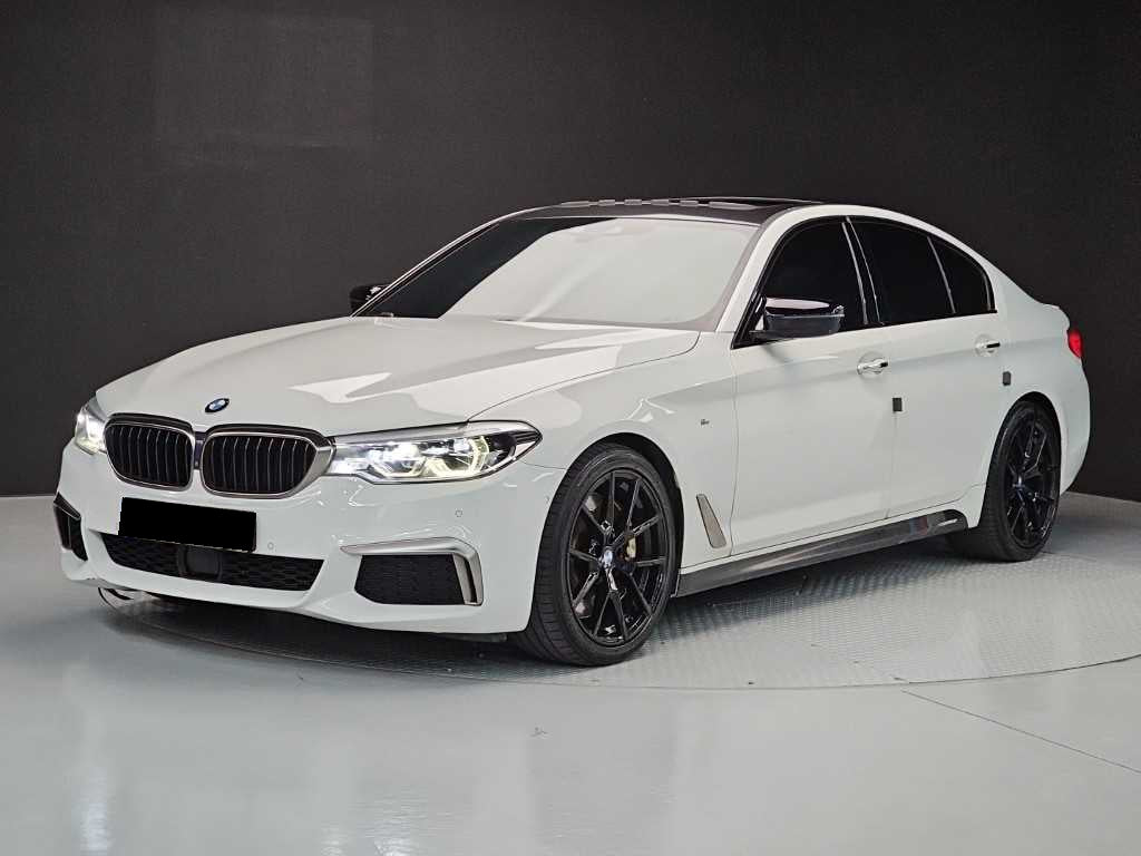 BMW 5-Series — photo 01