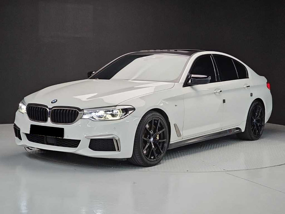 BMW 5-Series — photo 01