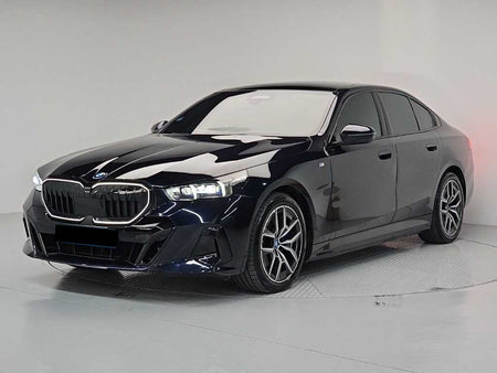 BMW i5 — photo 01