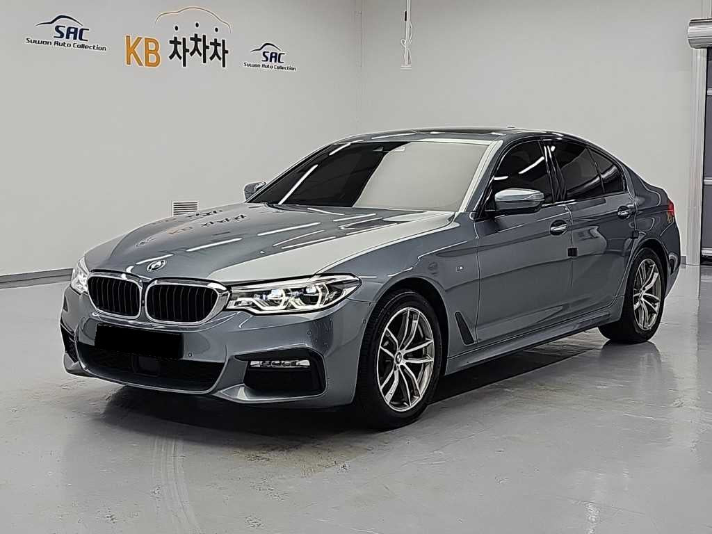 BMW 5-Series — photo 01