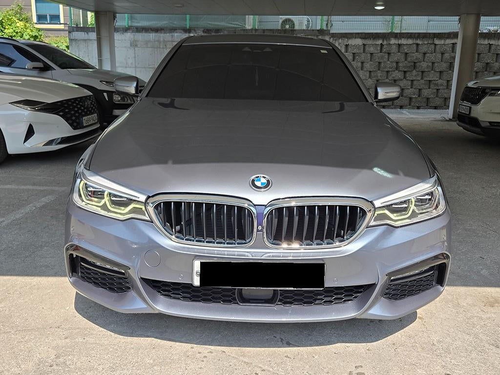 BMW 5-Series — photo 01