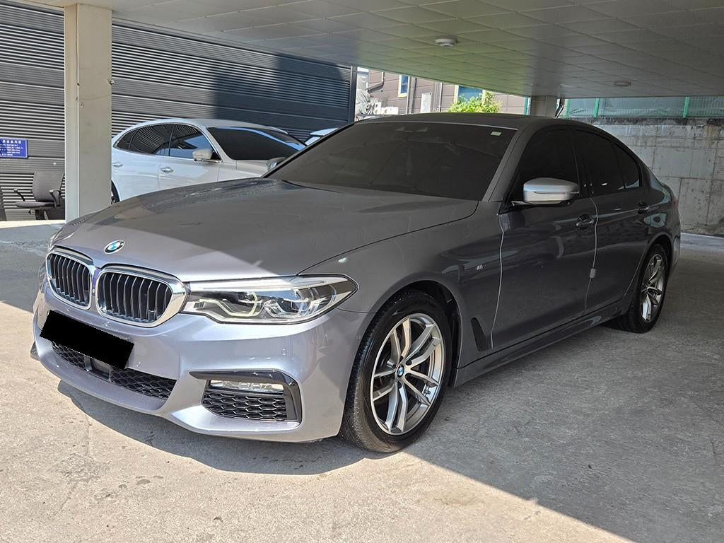 BMW 5-Series — photo 02