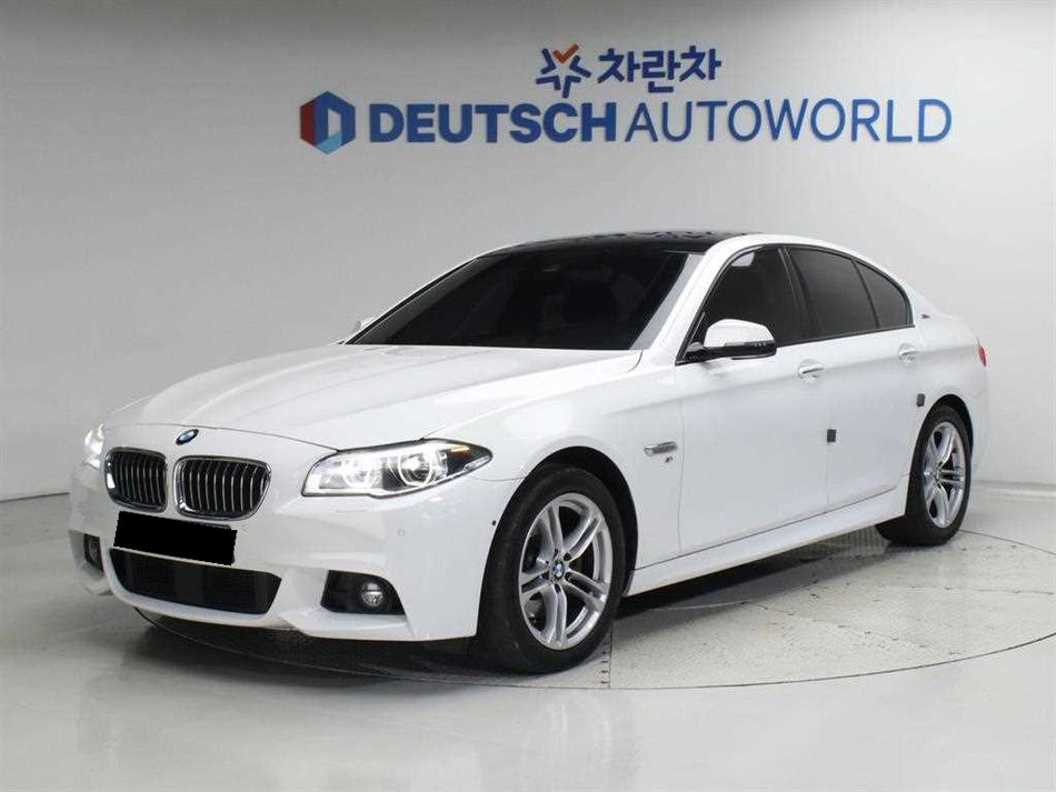 BMW 5-Series — photo 01