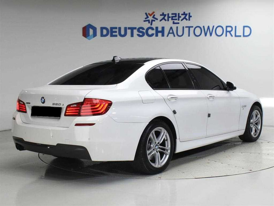 BMW 5-Series — photo 02