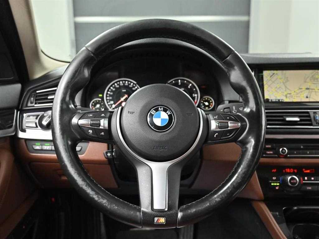 BMW 5-Series — photo 13