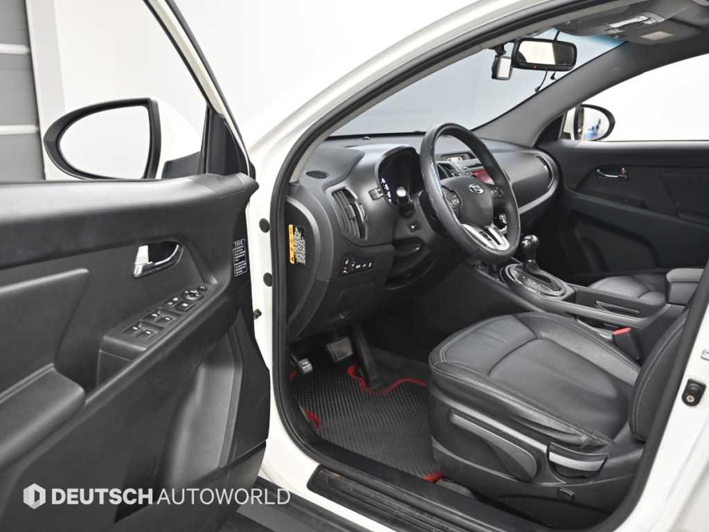Kia Sportage — photo 11