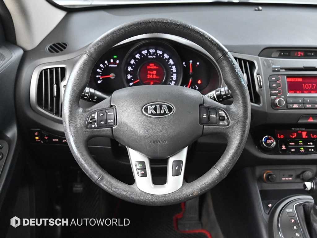 Kia Sportage — photo 13