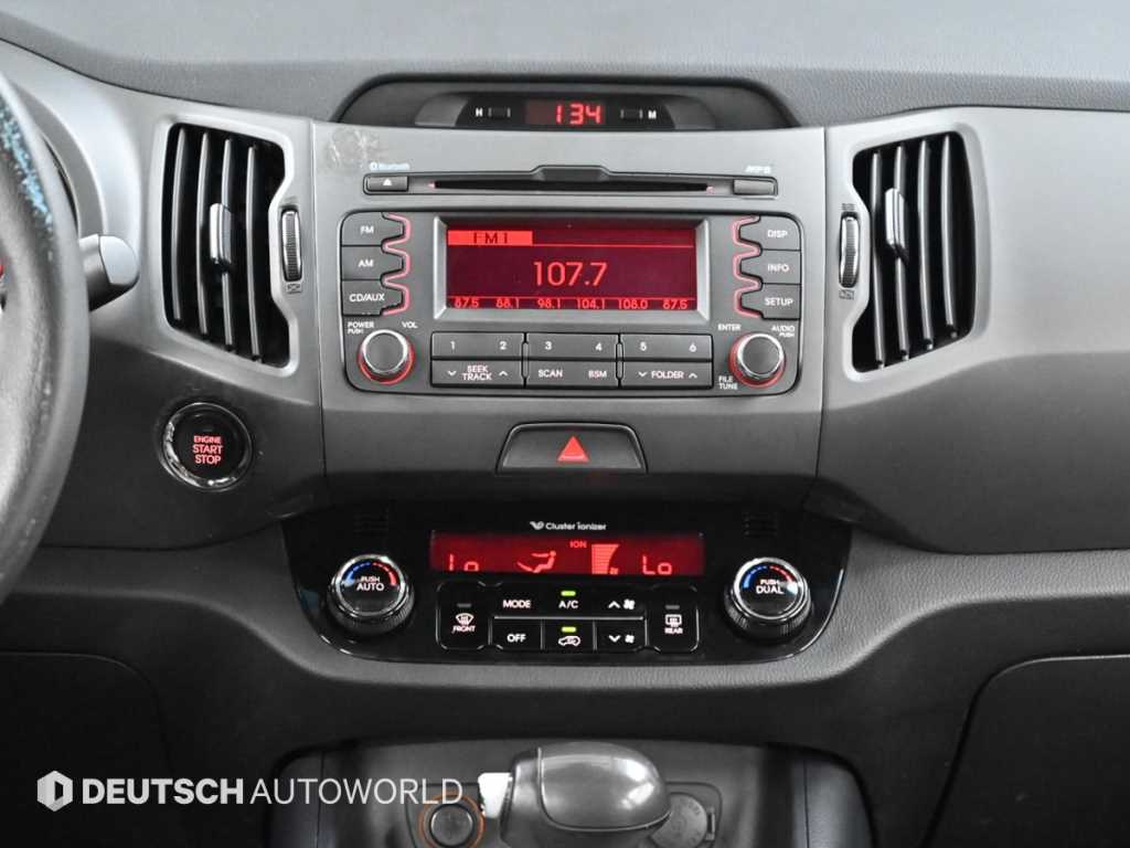 Kia Sportage — photo 14