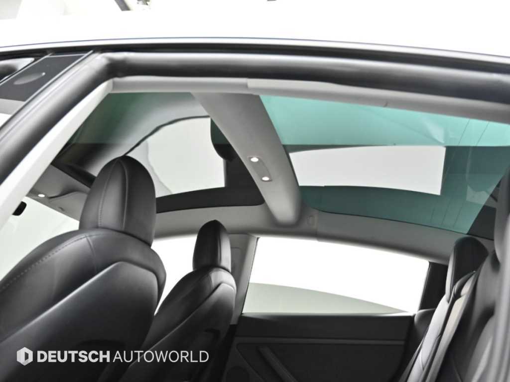 Tesla Model 3 — photo 18