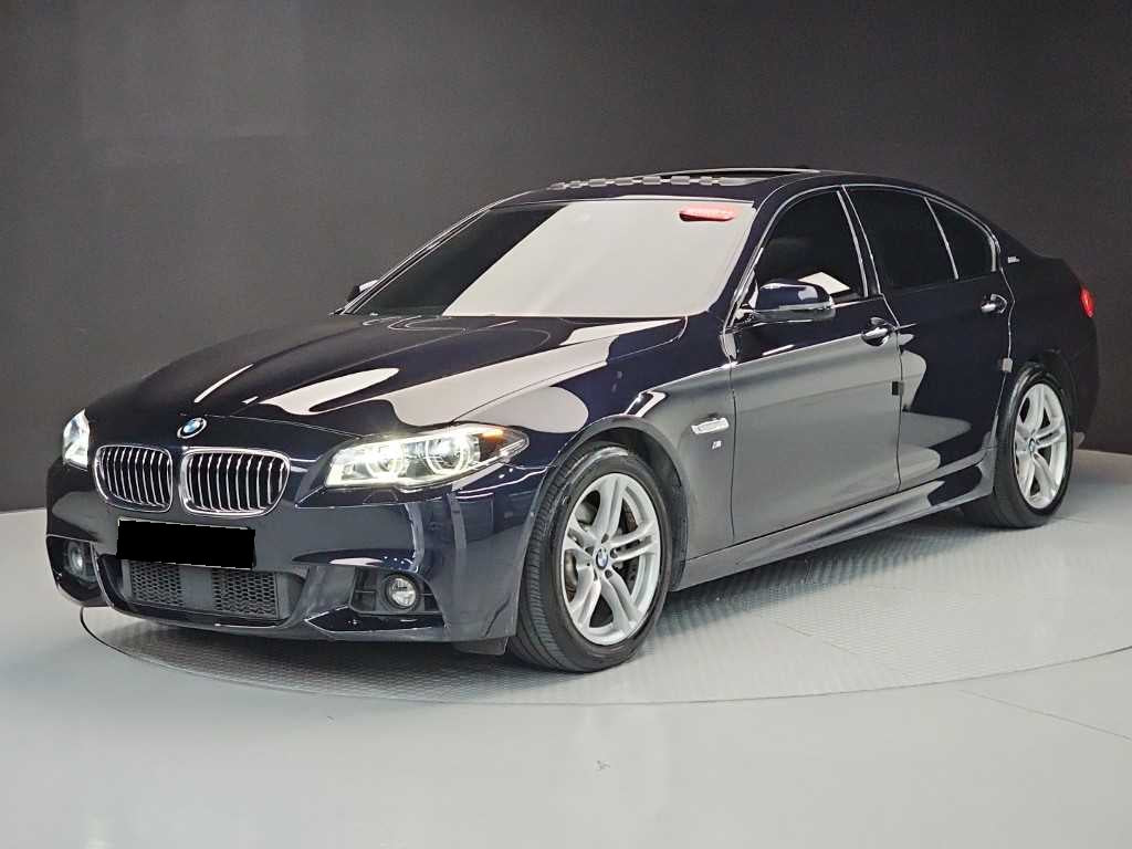 BMW 5-Series — photo 01