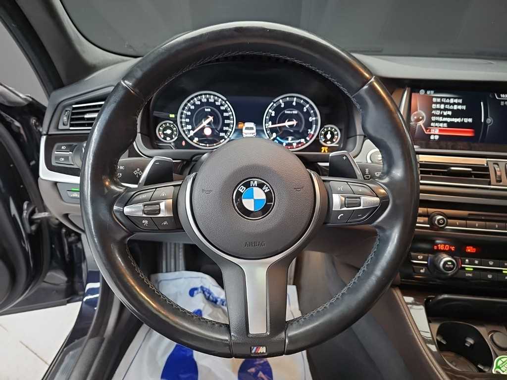 BMW 5-Series — photo 09