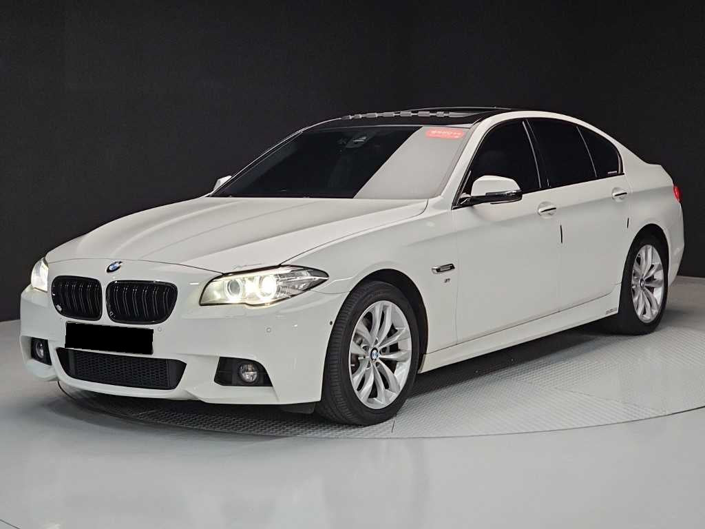 BMW 5-Series — photo 01