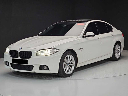 BMW 5-Series — photo 01