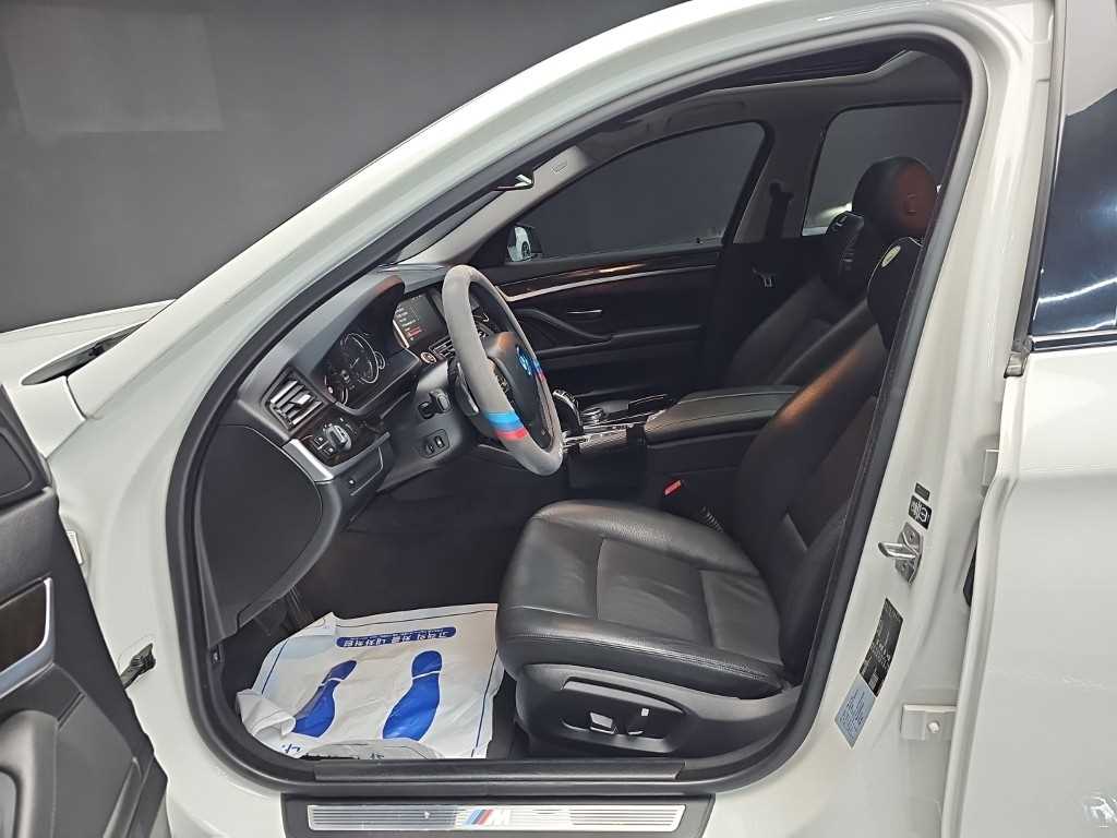 BMW 5-Series — photo 11