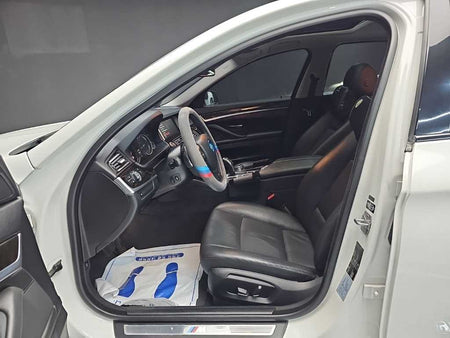 BMW 5-Series — photo 11