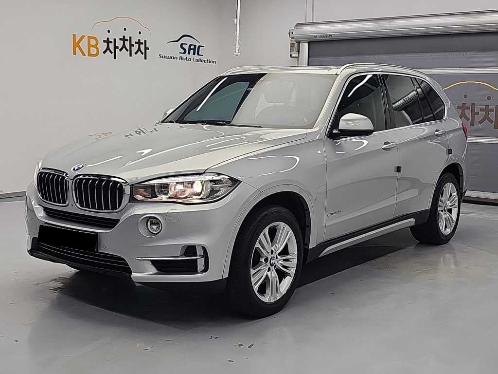 BMW X5 — photo 01