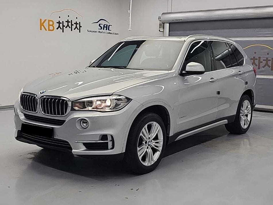 BMW X5 — photo 01