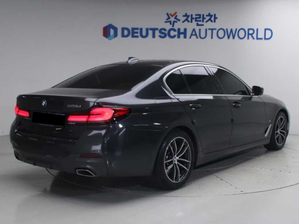 BMW 5-Series — photo 02