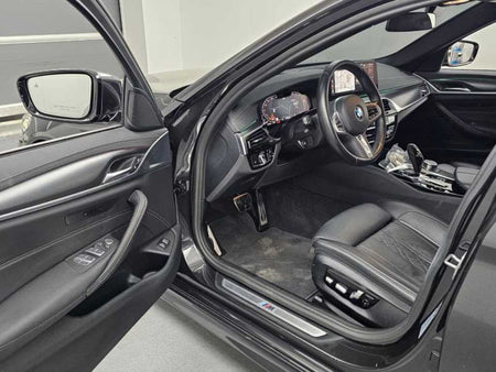 BMW 5-Series — photo 11