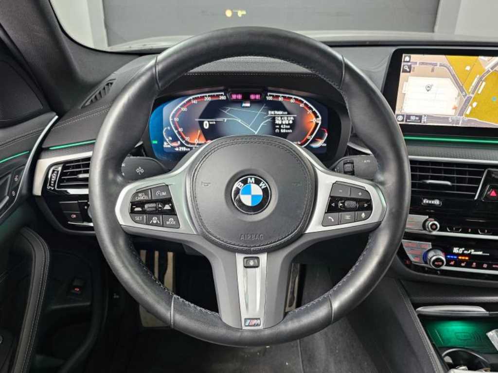 BMW 5-Series — photo 13