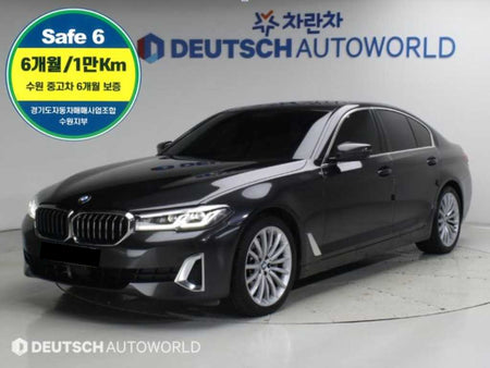 BMW 5-Series — photo 01