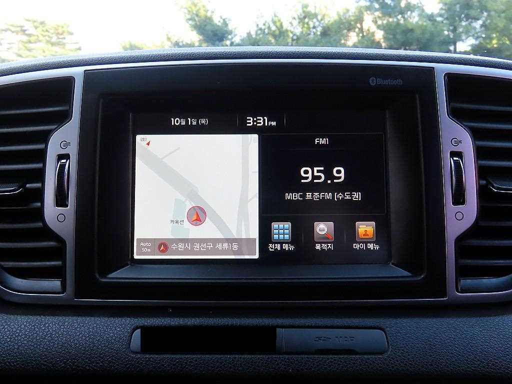 Kia Sportage — photo 14