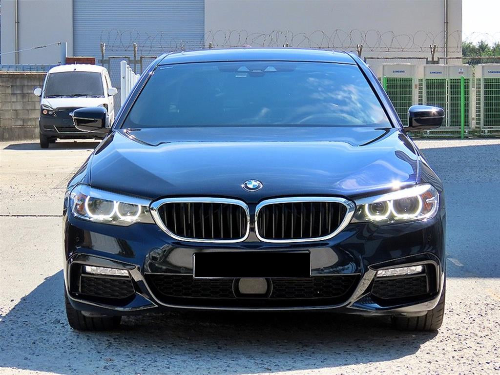 BMW 5-Series — photo 01