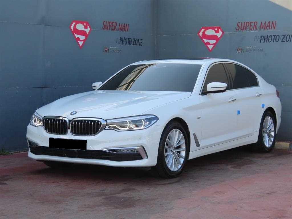 BMW 5-Series — photo 01