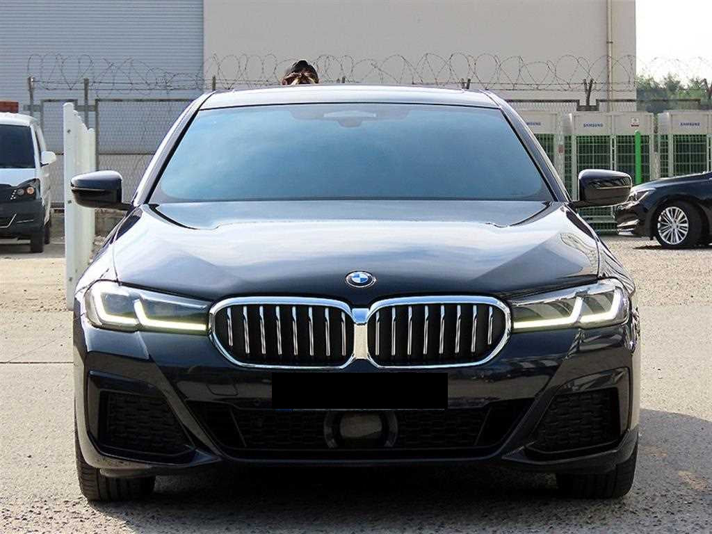 BMW 5-Series — photo 01