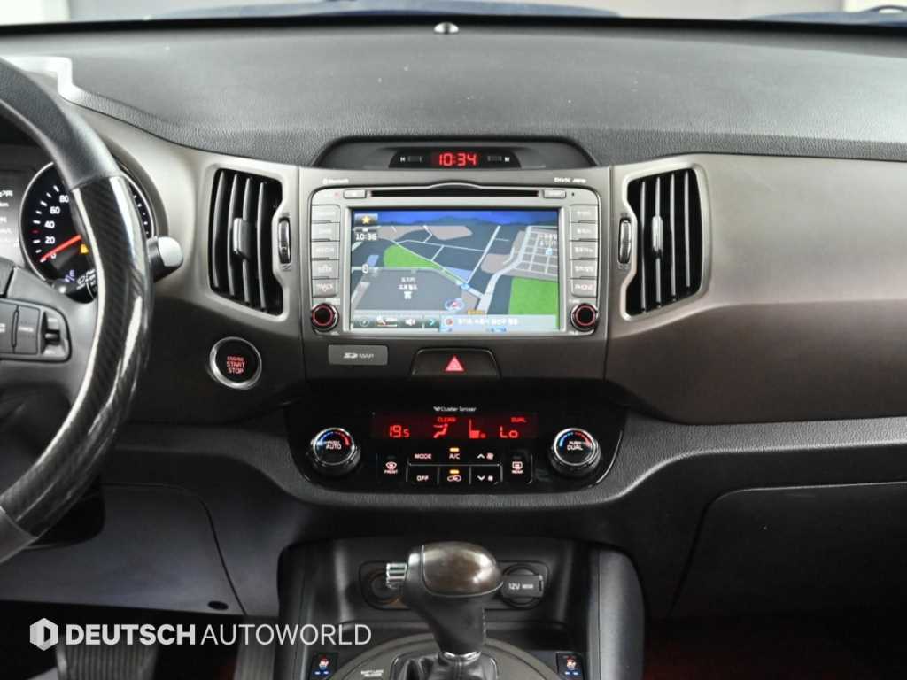 Kia Sportage — photo 14