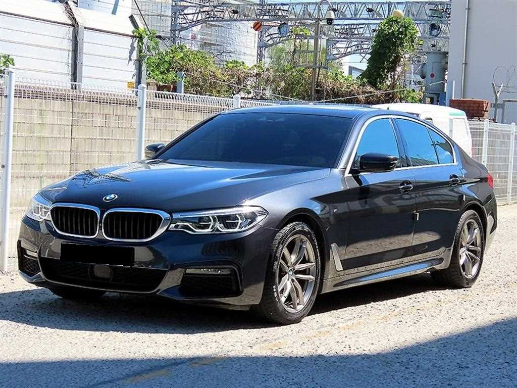 BMW 5-Series — photo 01