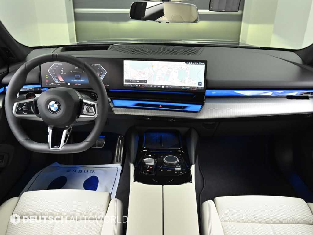 BMW 5-Series — photo 01