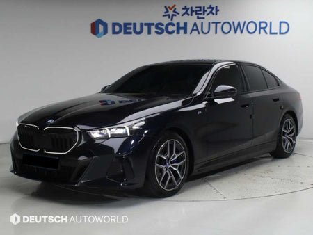 BMW i5 — photo 01