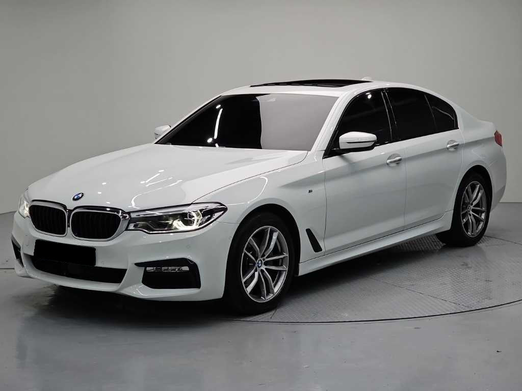 BMW 5-Series — photo 01