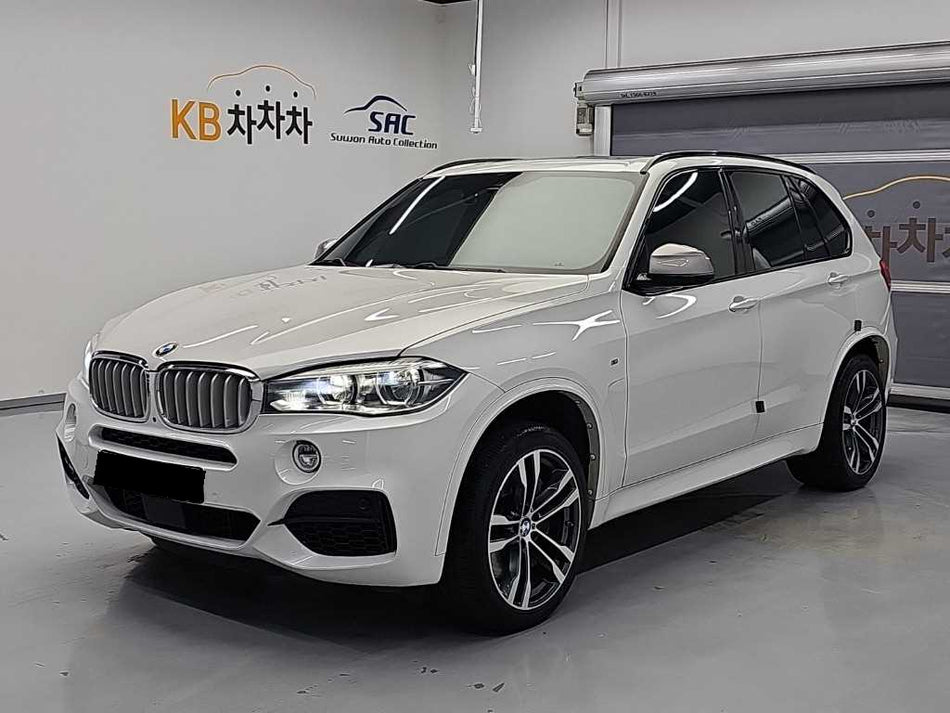 BMW X5 — photo 01