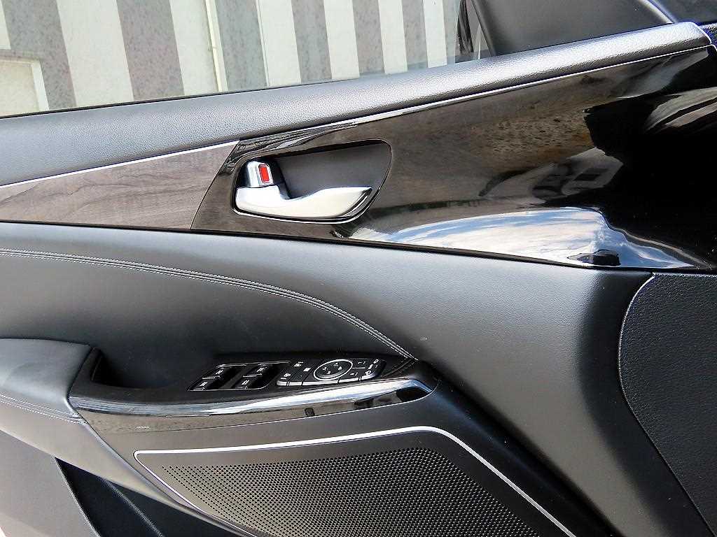 Kia K7 — photo 11