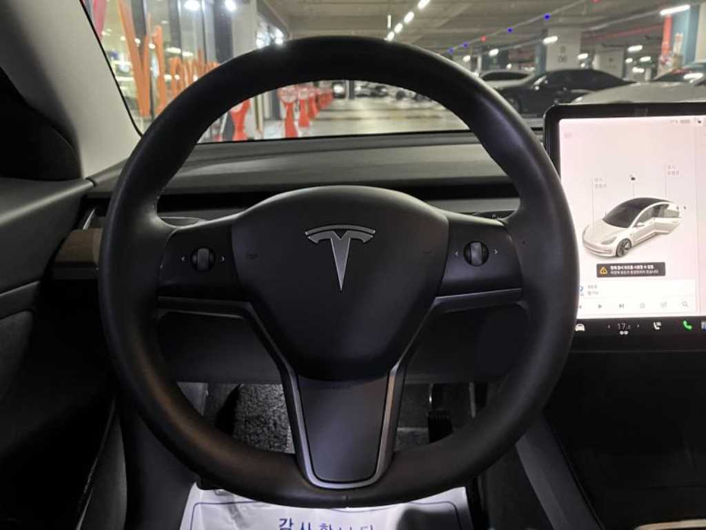 Tesla Model 3 — photo 11