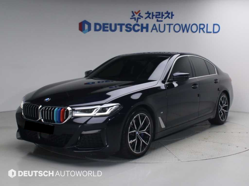 BMW 5-Series — photo 01
