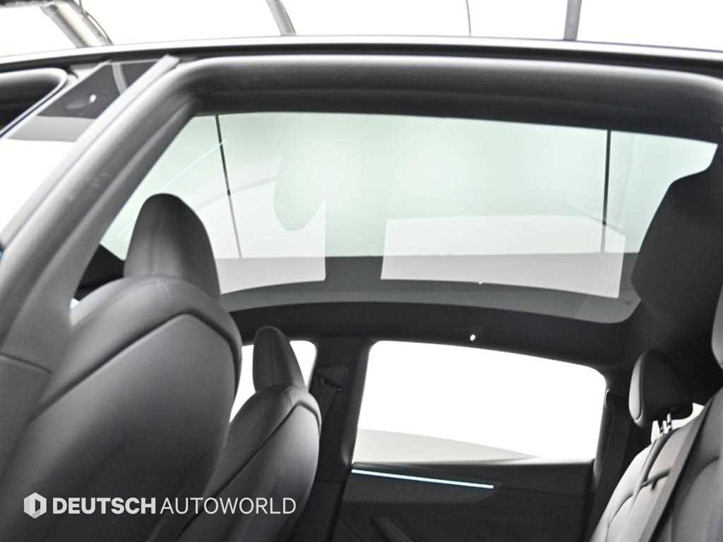 Tesla Model Y — photo 18