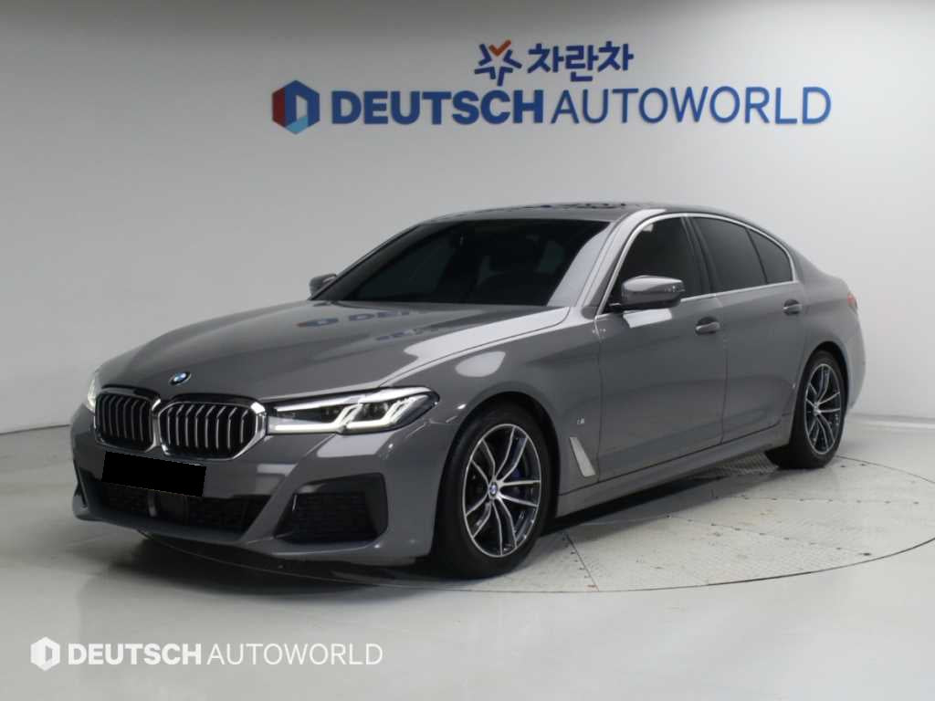 BMW 5-Series — photo 01