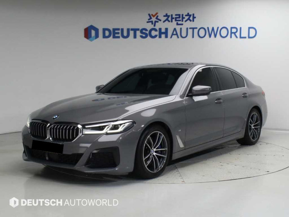 BMW 5-Series — photo 01