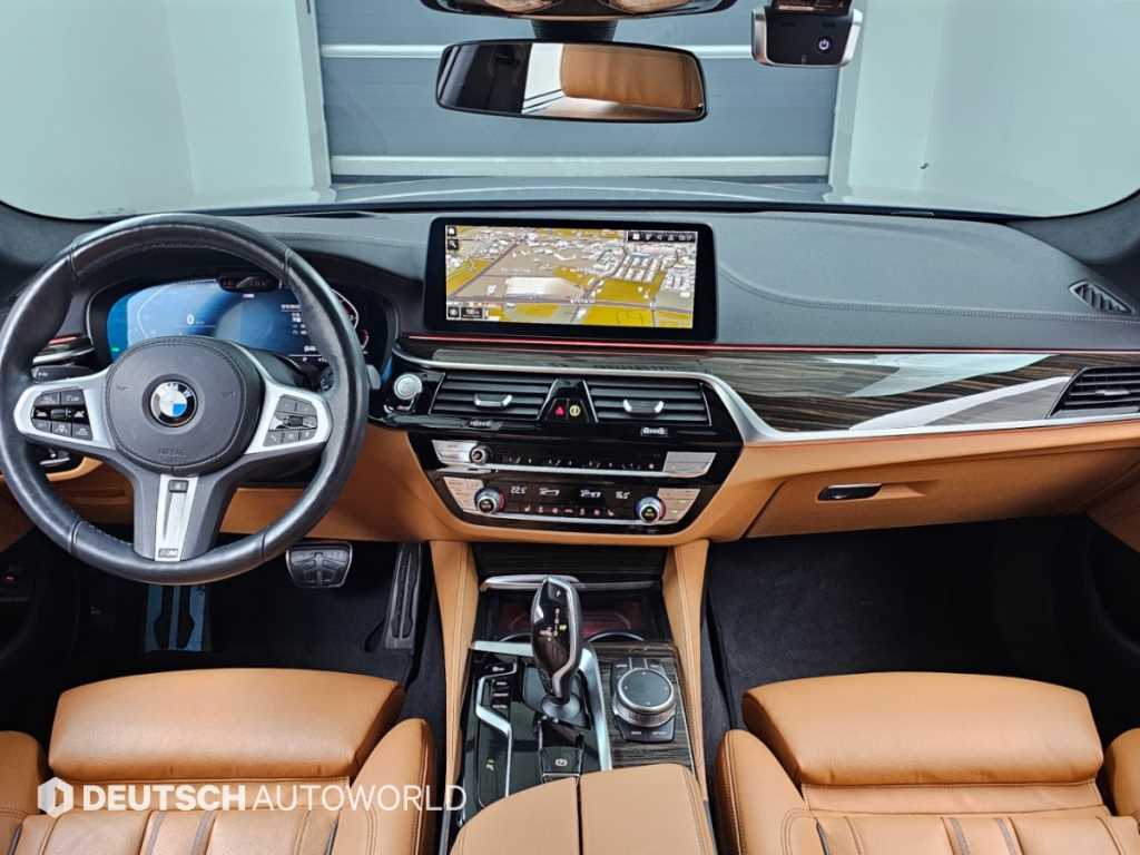 BMW 5-Series — photo 07