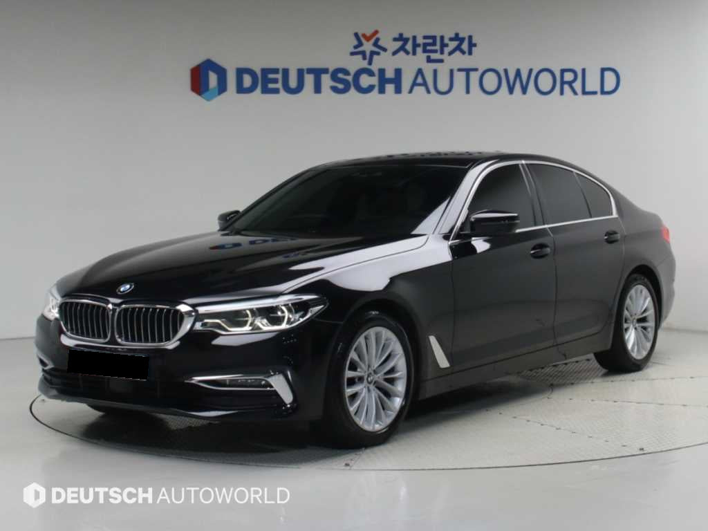 BMW 5-Series — photo 01