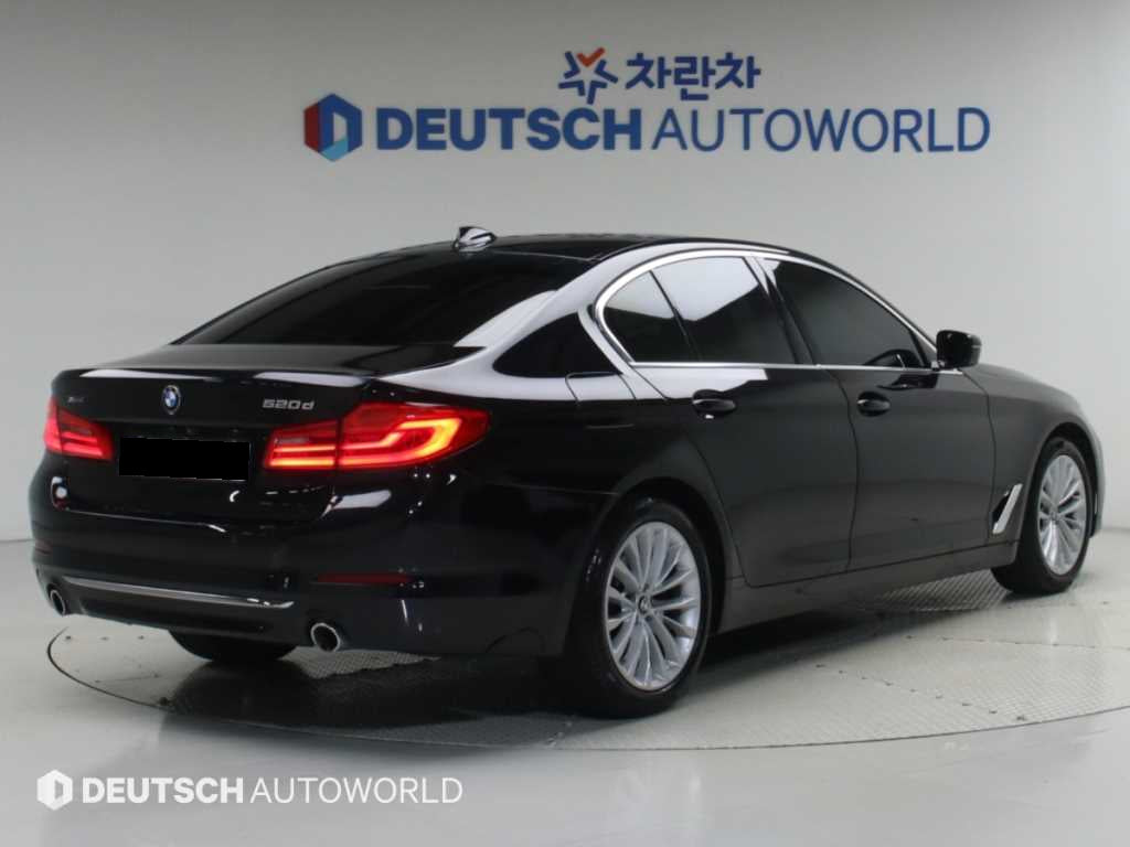 BMW 5-Series — photo 02