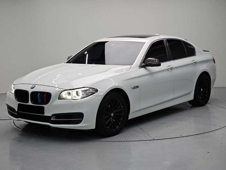 BMW 5-Series — photo 01
