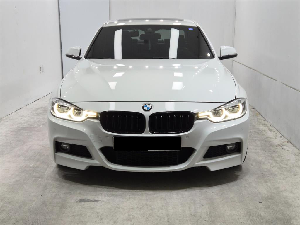 BMW 3-Series — photo 01