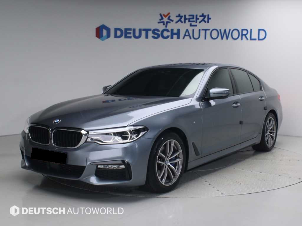 BMW 5-Series — photo 01