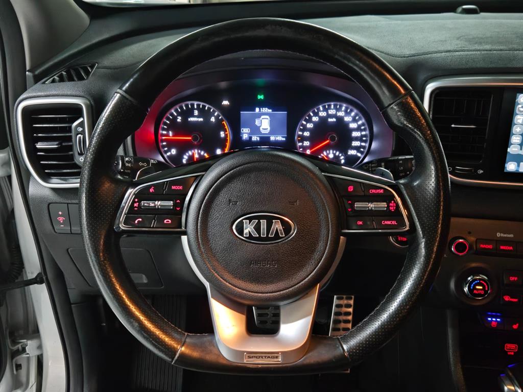 Kia Sportage — photo 10