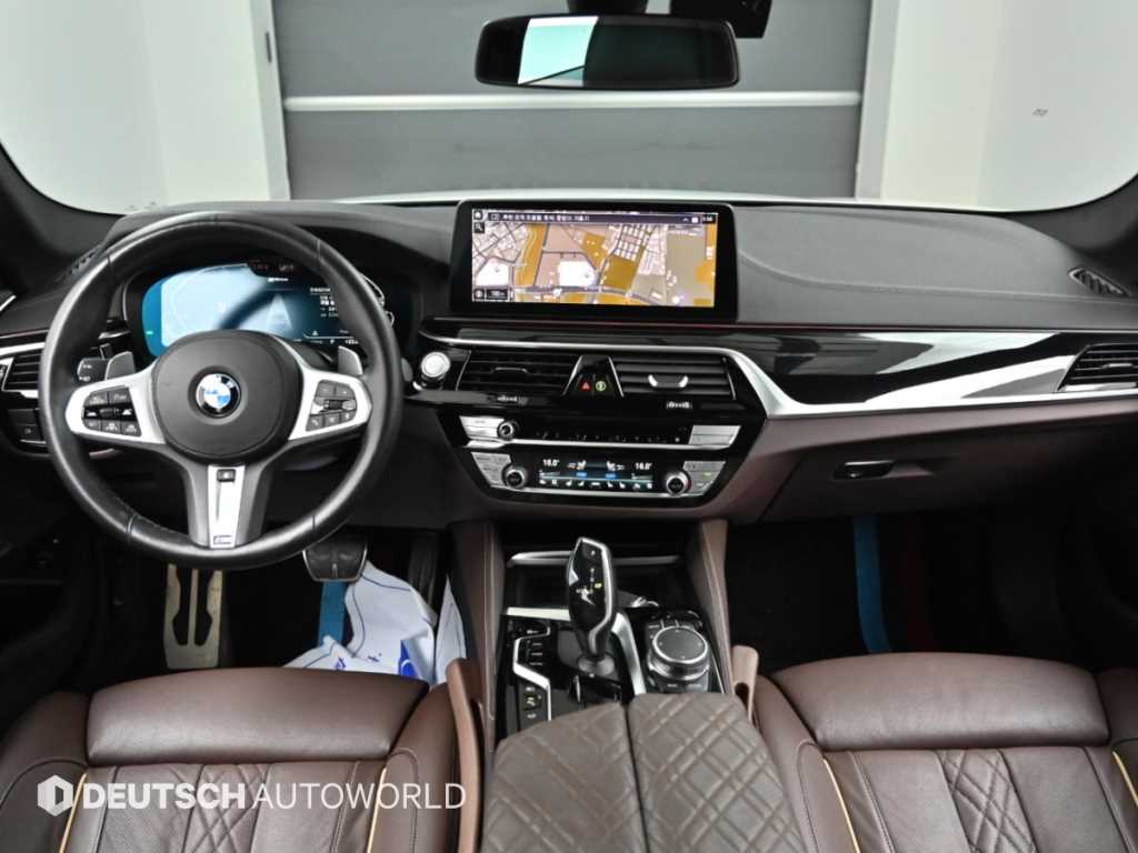 BMW 5-Series — photo 08